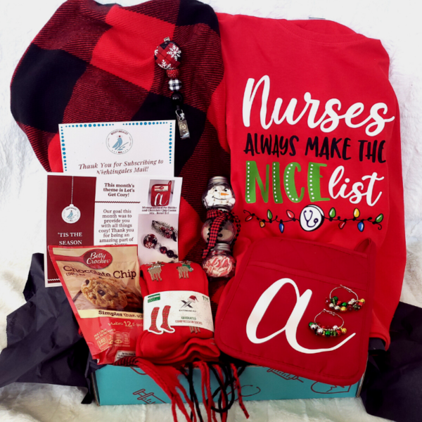 Nurse Box with nurse tshirt, poncho, cookie mix, hot chocolate, compression socks, badge reel and monogrammed potholder.