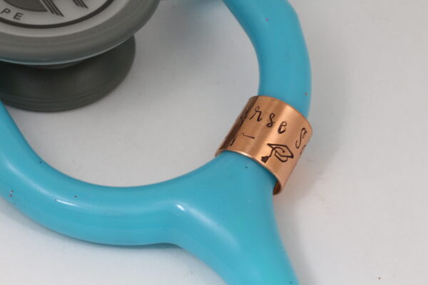 Copper stethoscope charm with graduation cap