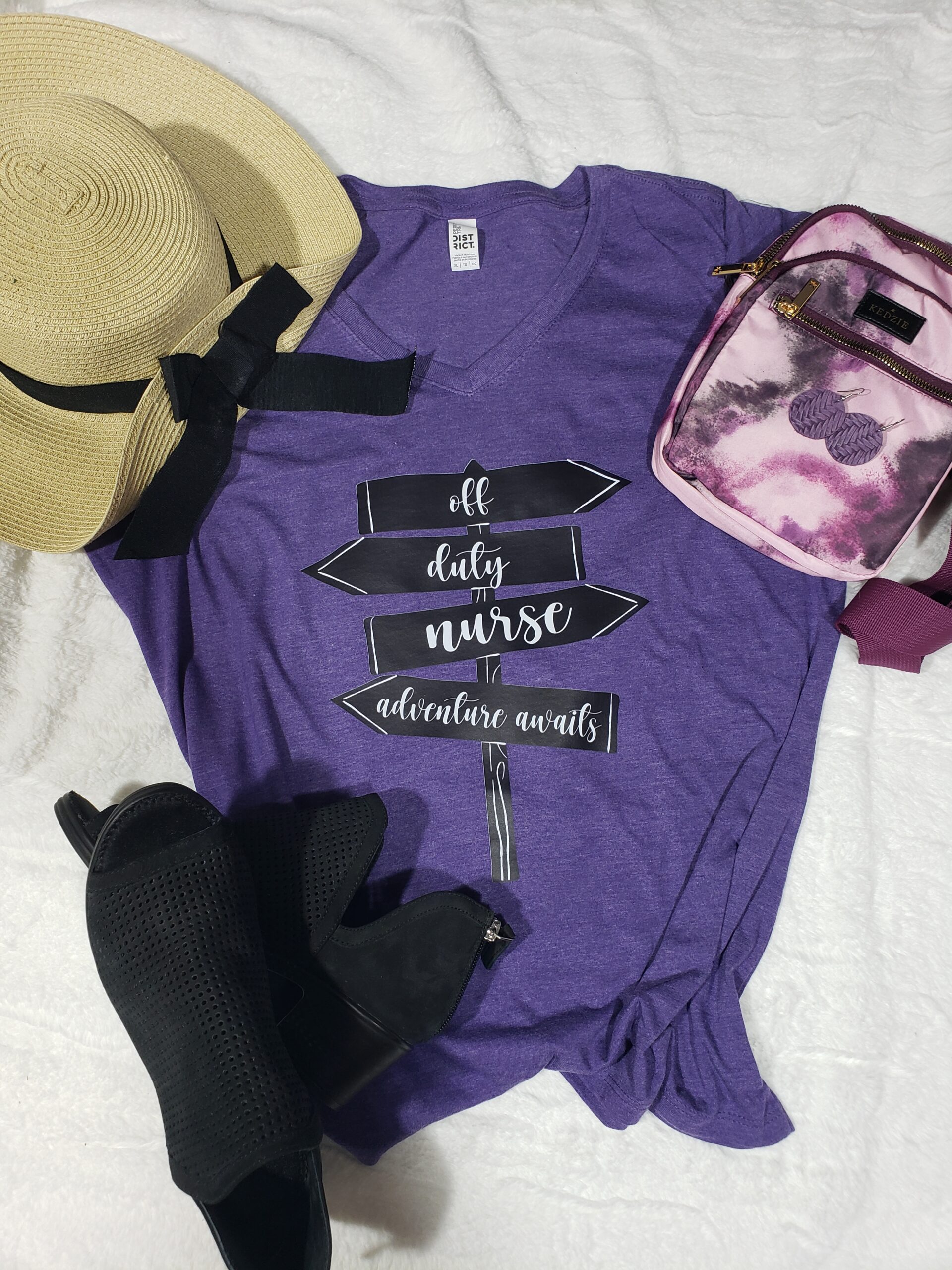 Off duty nurse purple vneck shirt with straw hat, tie die purple Kedzie bag and black mules