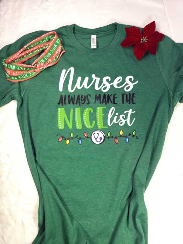 Green short sleeved tshirt with graphic on the front that says Nurses Always Make the Nice List and a red and green headband with buttons that says Naughty Nice